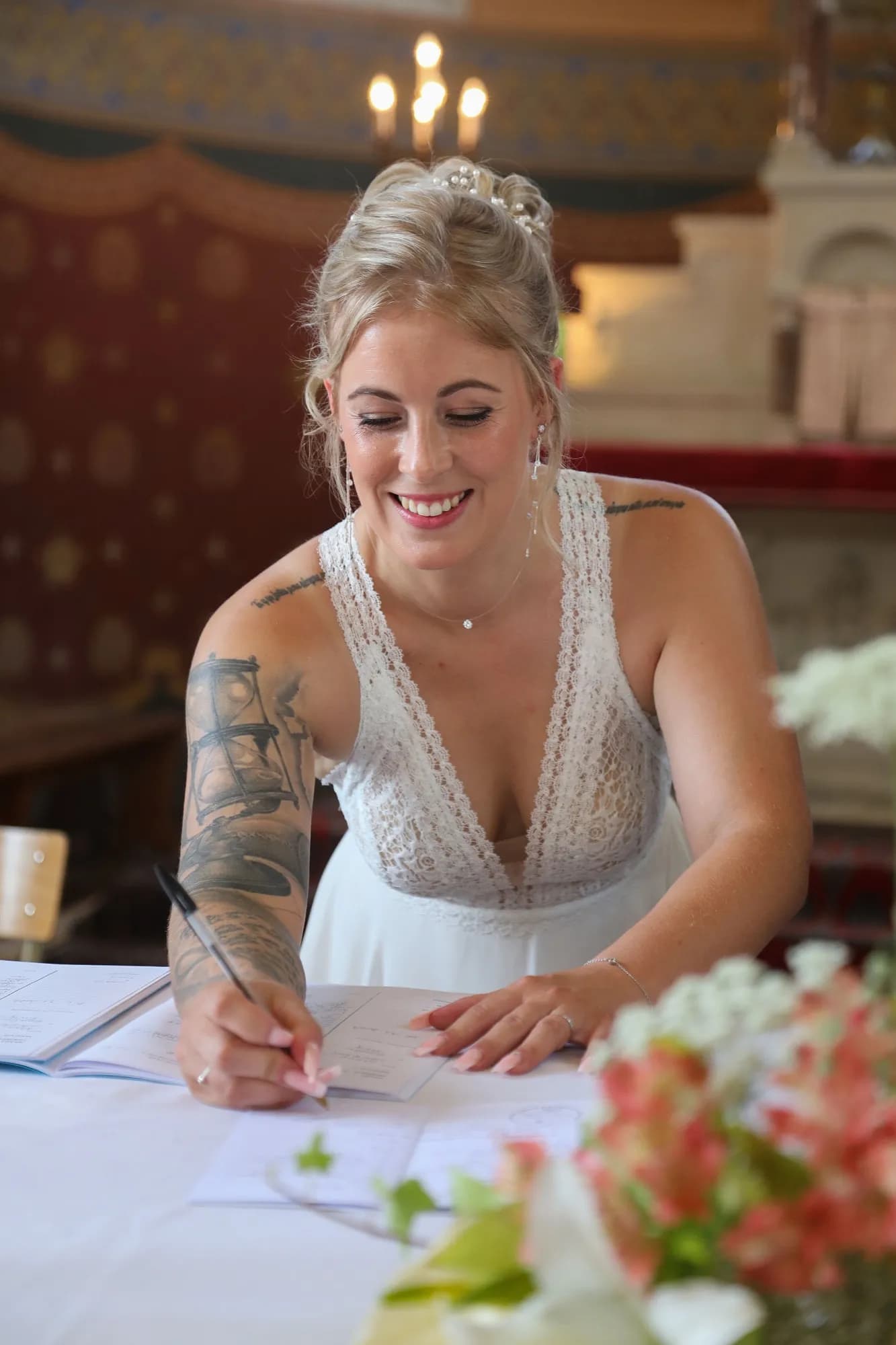 Mariée signant le registre